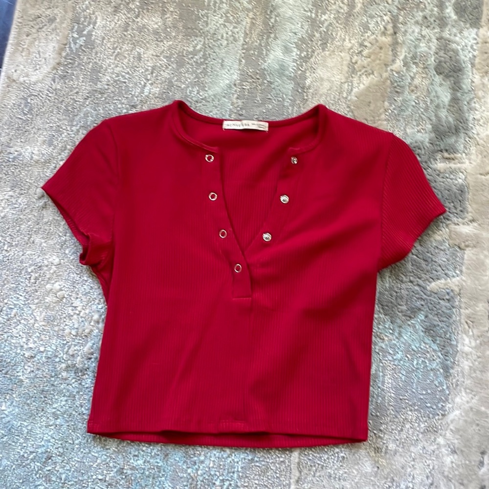 Cherry red crop top, never worn, tight, buttons make it easy to adjust